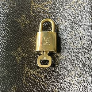 Louis Vuitton Lock and Key .  # 313